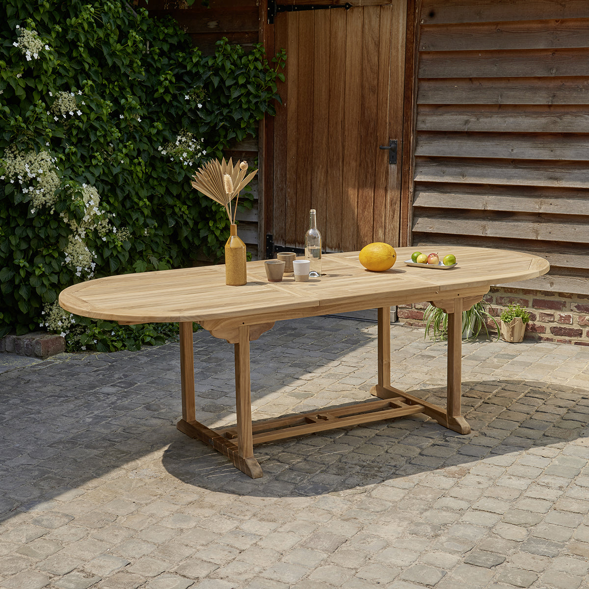 Ovaler Gartentisch für 8/10 Personen aus massivem Teakholz massiv, ausziehbar