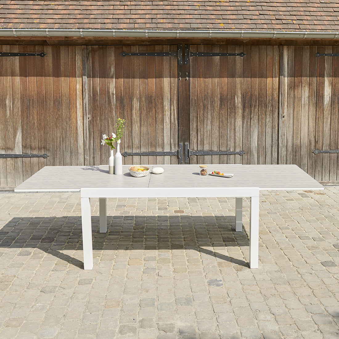 TULUM - Ausziehbarer Gartentisch aus Aluminium 6/10 Sitzplätze 