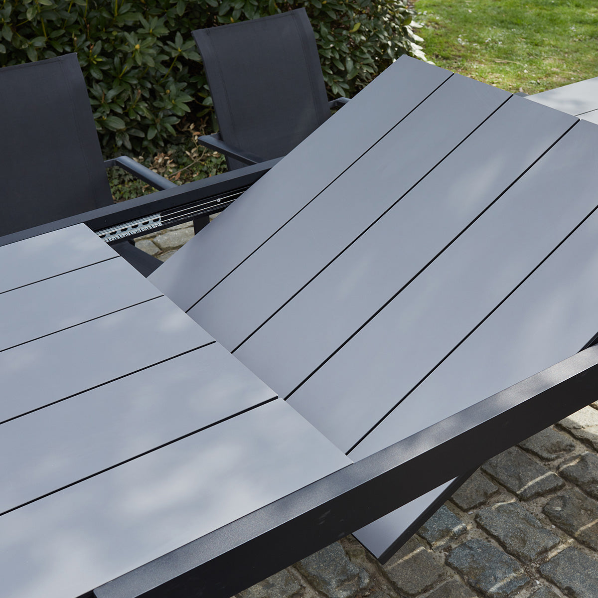 HPL STAR - Gartenmöbel aus schwarzem Aluminium und grauem Textilene 6/10 pers.