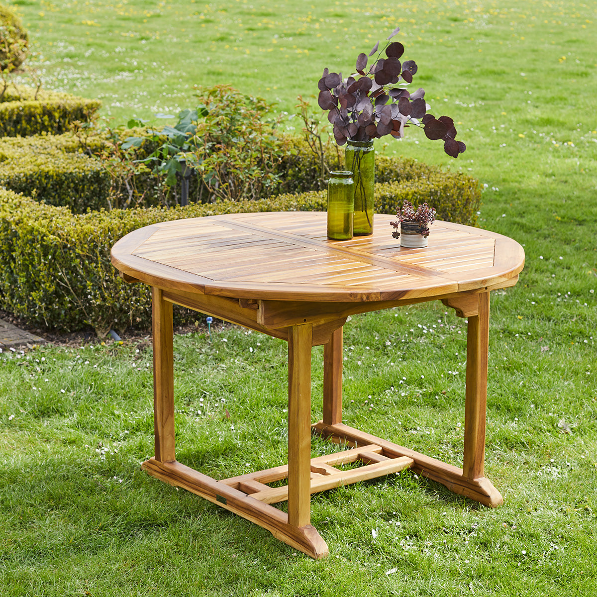 BALI - Ausziehbarer ovaler Gartentisch aus geöltem Teakholz 6/8-Sitzer