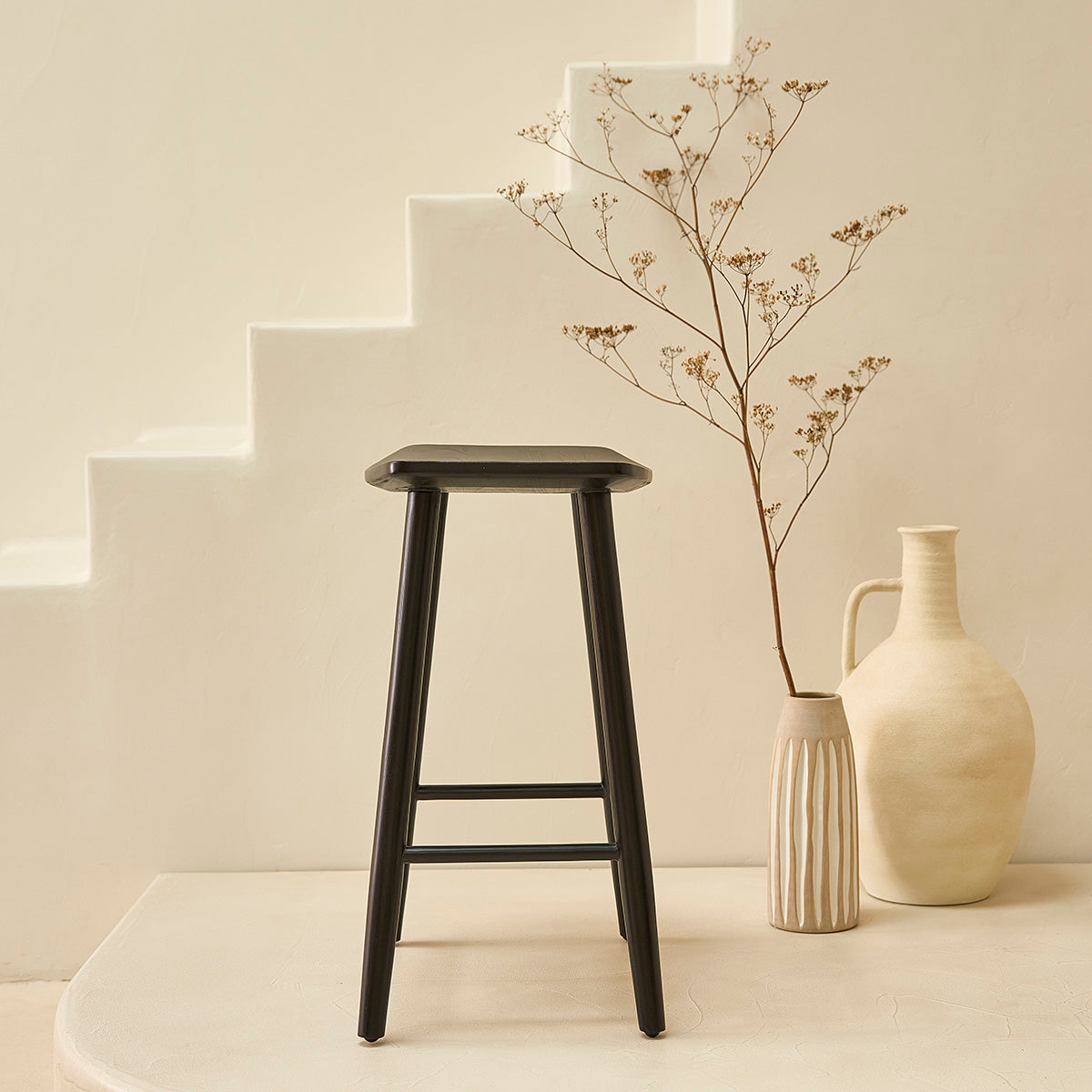 AMBRE - Hocker aus massivem Teakholz schwarz 65 cm